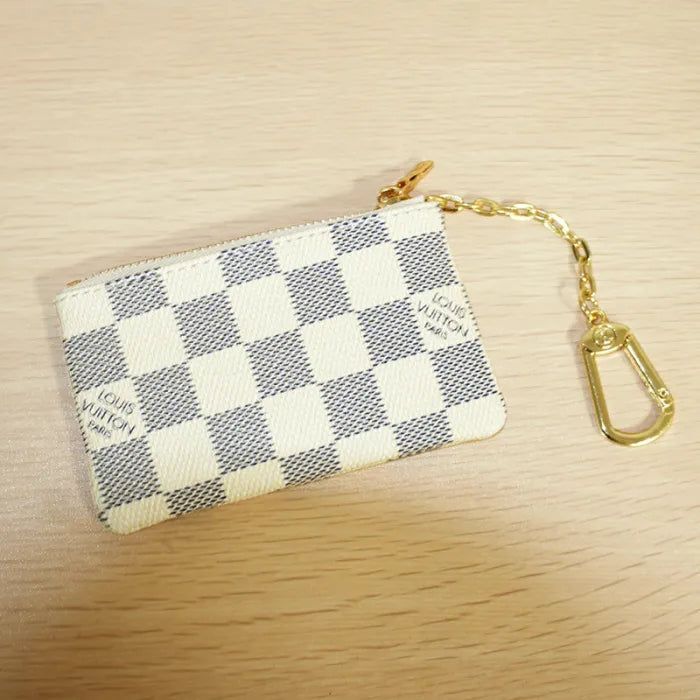 LOUIS VUITTON - WHITE CHECKERED CLUTCH