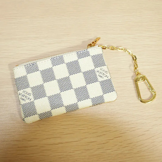 LOUIS VUITTON - POCHETTE CHECKERED WHITE