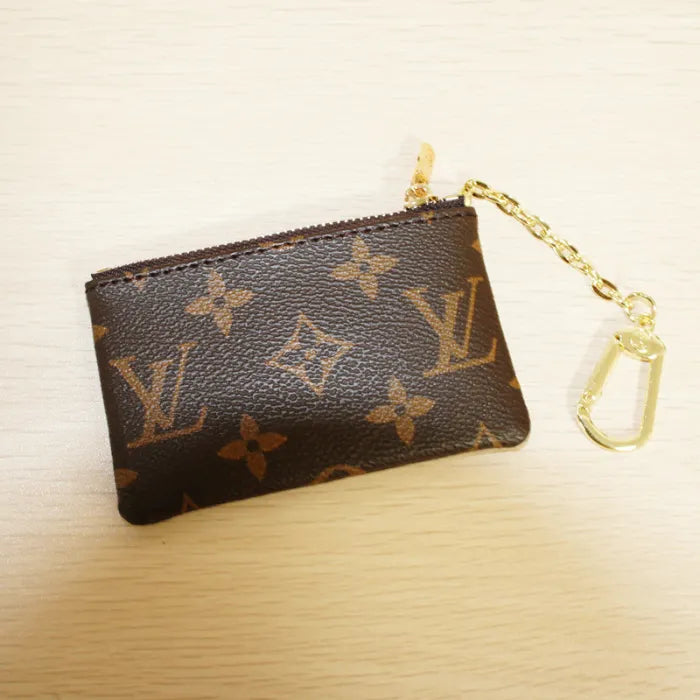 LOUIS VUITTON - CLASSIC MONOGRAM CLUTCH